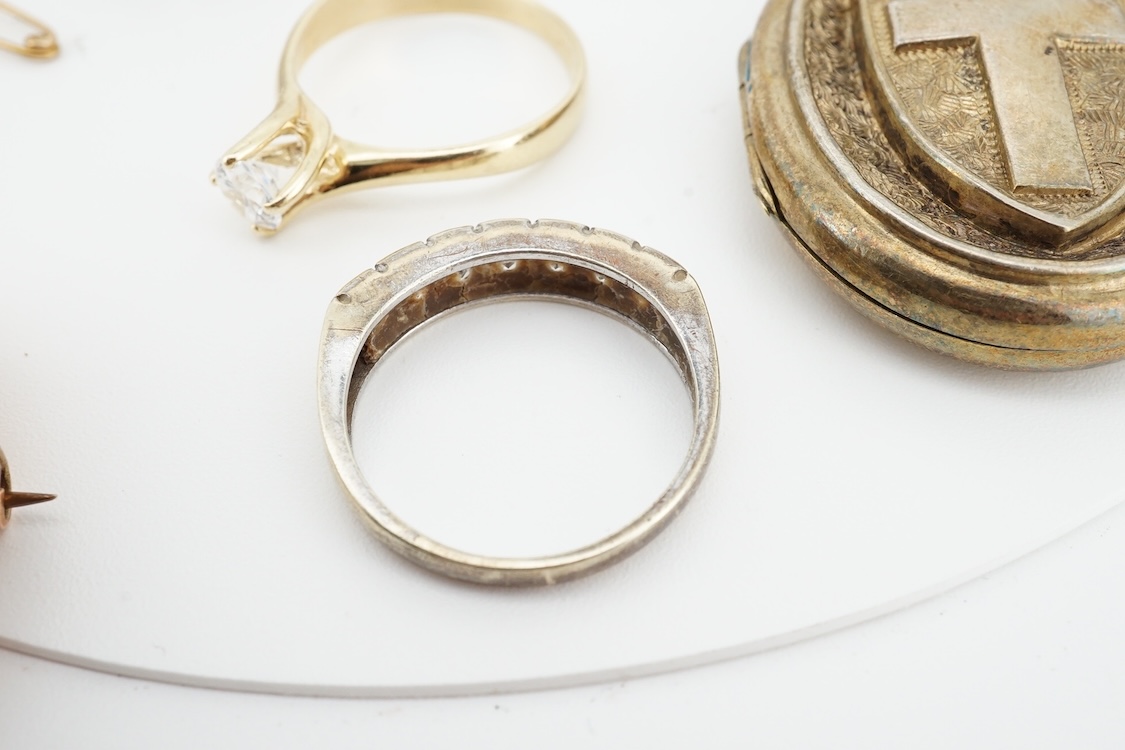 Two modern 9ct gold and cubic zirconia set rings, including white gold, two other simulated diamond set rings, together with an Italian cross pendant, a cameo brooch and an oval gilt metal locket.